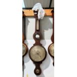 A 19th century large mercury column barometer with thermometer, in figured mahogany banjo case,