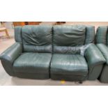 A 3 seater green leather reclining settee