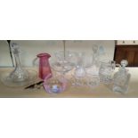 A selection of various decanters and cut and other glassware