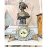 A marble and Spelter clock case with green and white marble with gilt fitting with Spelter bust of a