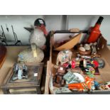 A collection of animal figures and decorative figures