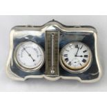 A silver mounted desk top compendium with thermometer, barometer and 8 day Brevet watch, folding