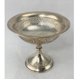 A silver pedestal sweetmeat dish with pierced border, 4.6oz, Birmingham, 1929