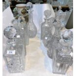 A selection of cut glass decanters