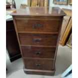 An Edwardian mahogany narrow 4 height chest of drawers
