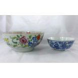 A 19th century Chinese famille rose bowl decorated with flowers, diameter 23cm, hairline crack and a