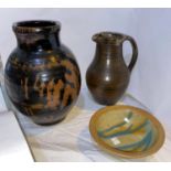 A brown glazed studio pottery jug by David Leech, height 20 cm; an ovoid studio pottery vase with