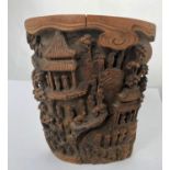 A 19th century Chinese extensively carved bamboo brush pot with temples, trees, figures, height 17.
