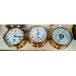 A brass set of 3 reproduction ships clocks and barometer
