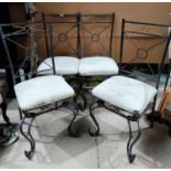 A set of 4 conservatory/dining chairs in gilt/black wrought metal