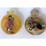 Two Chinese reverse painted snuff bottles
