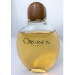 A shop display perfume bottle: Calvin Klein "Obsession"