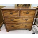 An Edwardian small crossbanded chest of 2 long and 2 short drawers with brass swan neck handles,