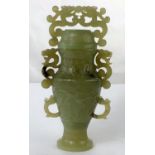 A Chinese hard stone "Mutton Fat" vase and cover with relief and pierced decoration height 18cm