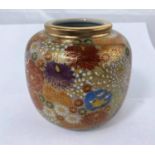 A Japanese jar with detailed floral decoration with gilt highlight and rim with signature to base,