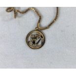A St Christopher fob, stamped '9ct', on 9 carat hallmarked gold fine box chain, 4.9 gm
