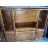 A vintage Jentique sideboard with display cupboards, drop front cocktail section length 160cm x