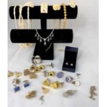 A selection of costume jewellery including modern carved bone beads and bracelet; etc.