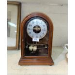 A mid 20th century 'Bulle' mantel clock, battery operated, in arch top mahogany case, height 33 cm