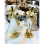 A pair of Murano glass figures in courtesan style dress in white and yellow 47cm x 43 cm bearing