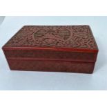 A Chinese cinnabar coloured lacquer box of squared form cigarette box 14.5cm