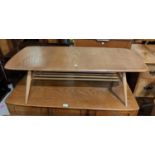 A 1960's Ercol light elm coffee table with undershelf