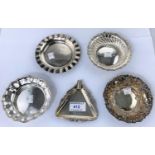 Four various hallmarked silver bon-bon dishes and a triangular hallmarked silver ashtray, various