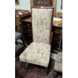 A 19th century rosewood chair with high back and carved crest, on barley twist legs, reupholstered