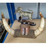 A 19th century horn and hoof snuff mull; a brass figure: dog with game bird