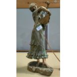 A French Spelter lamp in the form of a woman with fan in green and gilt (signed to base)
