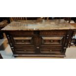 A 19th century oak blanket box in the William & Mary style, with hinged lid and geometric moulded