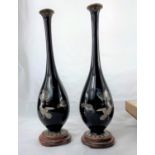 A Japanese pair of fine cloisonné vases of elongated baluster form, with long slender necks,