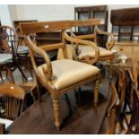 A Regency mahogany set of 7 (5 + 2) dining chairs on turned legs, with brown fabric drop in seats