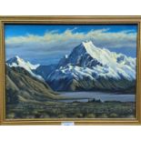 A mountainous landscape with snowy caps and a lake below, oil, signed, Frazer '83