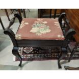 An Edwardian stained wood piano stool with box seat