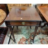 An Edwardian crossbanded mahogany Pembroke table with frieze drawer, on turned legs and castors