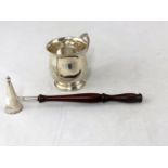 A silver baluster shaped christening mug, 4.1oz and a silver candle snuffer with turned hardwood