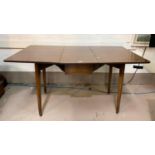 A 1960's drop leaf dining table with rosewood effect laminate top