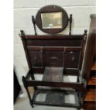 A 1930's oak hall stand with mirror and glove box
