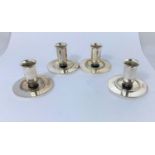 A continental set of 4 silver dwarf candlesticks on wide circular bases, import marks for 1969, 12