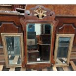 A Chippendale style wall mirror in mahogany and parcel gilt fretwork frame; 3 gilt framed