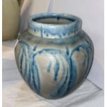 A Royal Lancastrian vase of ribbed ginger jar form, with blue fronds over grey, impressed mark 'E.
