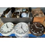 A cuckoo clock, modern wall clocks and novelty clocks