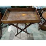 A 19th century mahogany Butler's Tray on folding stand
