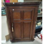 An oak single panel door corner cupboard 104 x 75cm