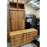 A modern pine 3 piece bedroom suite comprising double door wardrobe, side by side chest of 8