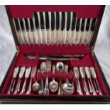 A hallmarked silver canteen of rat tail cutlery, 8 setting, 87 pieces, silver handle knives with