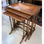 A nest of 3 trio tables in crossbanded mahogany