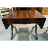 A 19th century Regency style rosewood table, the 2 frieze drawers and corresponding false fascias