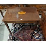 An Edwardian crossbanded mahogany occasional table with rectangular top